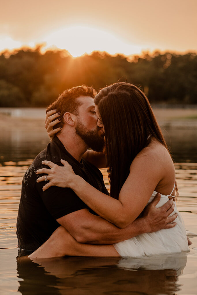 Couples photoshoot at sunset in the lake