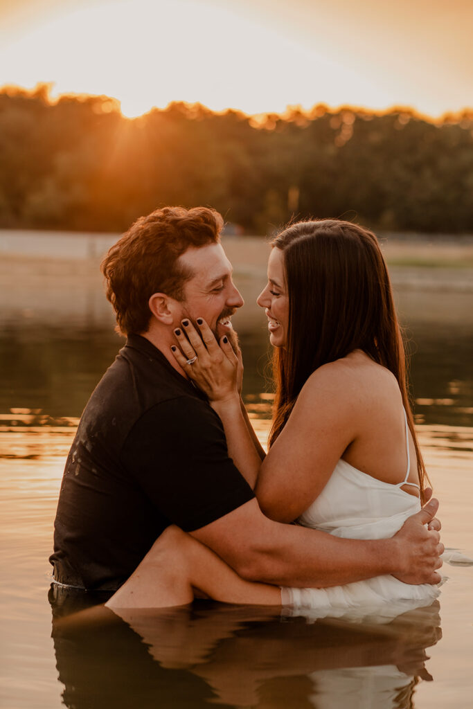 Couple laughing in the lake