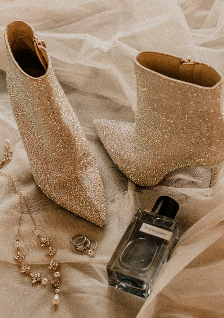 Detail Shot of Shoes, Jewelry and Perfume 