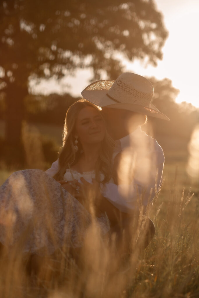 couple sitting on ground together 