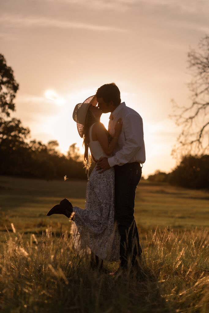 couple kissing in sunlight