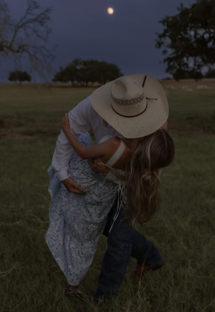 couple kissing with moon 